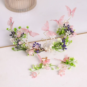 Parure de mariée style forêt avec papillons roses, fleurs et boucles d'oreilles clips
