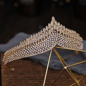 Luxurious gold crystal bridal crown with sparkling rhinestones for wedding and pageant
