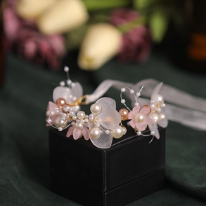 Pink floral bridal wrist corsage with pearls and chiffon ribbon for wedding parties
