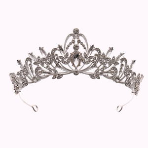 Elegant silver tiara with sparkling crystal rhinestones and baroque pear-shaped centerpiece