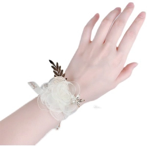 Corsage de poignet de demoiselle d'honneur en maille blanche avec strass et ruban