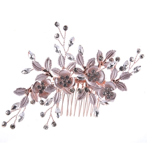 Rose gold bridal hair comb with alloy flowers, leaves and sparkling crystals on white background