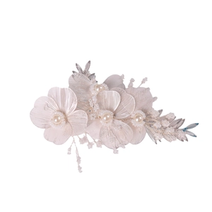 Exquisite handmade floral bridal headband with metallic petals and pearl accents