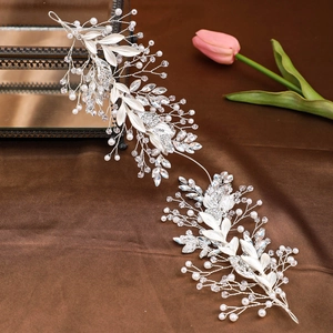 Silver bridal headband with white pearls, crystals and metal leaves on brown silk