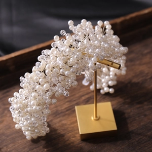 Luxurious braided headband with ivory pearls and crystal beads for bridal wedding wear