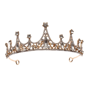 Luxurious gold crystal bridal tiara with sparkling rhinestones for wedding hairstyles
