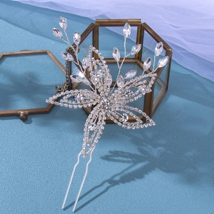 Handmade bridal hair pin featuring silver rhinestone flowers and sparkling wire details