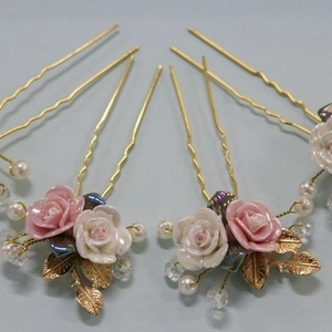 Handmade gold bridal hair pins with ceramic pink roses and pearls for wedding hairstyles