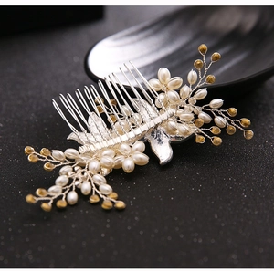 Elegant bridal hair comb with white pearls and amber beads on silver metal tines