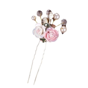 Golden bridal hair pin with resin roses, pearls and crystals for wedding hairstyles