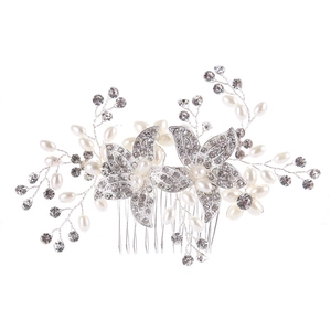 Elegant bridal hair comb with silver rhinestones and white pearls for wedding hairstyles