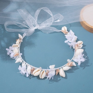 Oceanic shell headband with white fabric flowers and translucent mesh ribbons