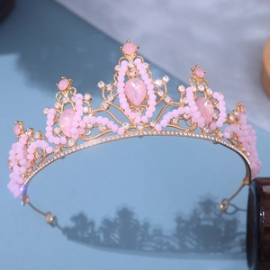 Macro shot of European bridal crown with pink crystals and rhinestones for wedding