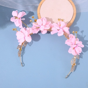 Pink fabric flower bridal headband with golden leaves and sparkling rhinestones
