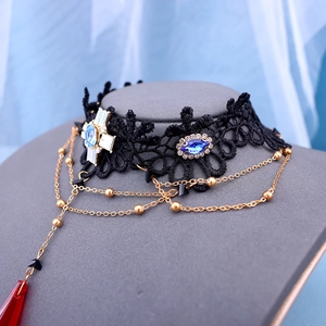 Gothic black lace choker necklace with blue crystals and layered gold bead chains