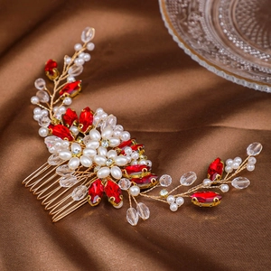 Elegant handmade gold hair comb with red crystal leaves and white pearls for bridal styling