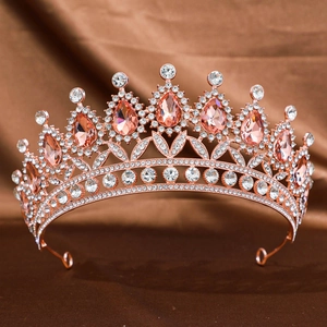 Elegant rose gold bridal tiara with pink teardrop gemstones and sparkling white crystals