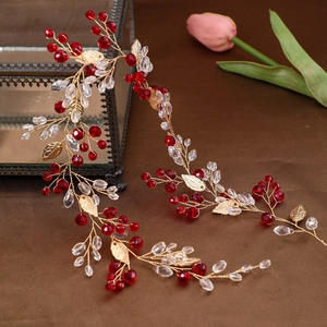 Handmade bridal headband with crystal beads and gold leaves on vintage velvet