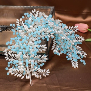 Elegant bridal headband featuring white pearls and blue beads on silver woven wire
