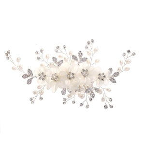 Elegante bruidshaarkam met witte gaasbloemen, kunstparels en strass-steentjes op zilverdraad