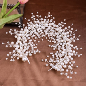 Handmade bridal headband with white imitation pearls on silver wire for weddings