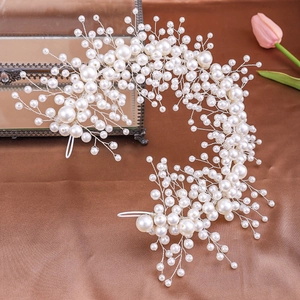 Elegant handmade bridal headband with white imitation pearls and intricate wire design
