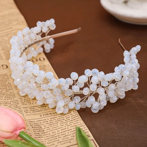 Handmade woven bridal headband with sparkling beads and metallic wires for wedding styling