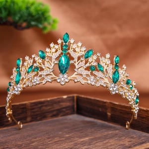 Elegant gold bridal tiara with emerald green gems and rhinestones for parties