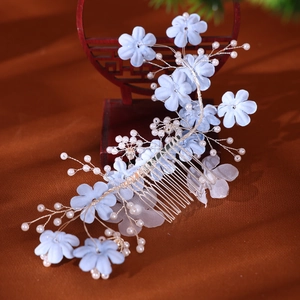 Elegant bridal hair comb with light blue fabric flowers and pearls on silver wire