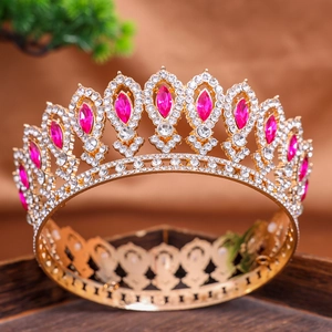 Luxurious gold baroque bridal crown featuring pink teardrop crystals and clear rhinestones