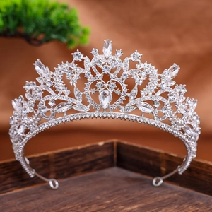 Detailed macro view of the silver Baroque crown with sparkling rhinestones and crystals
