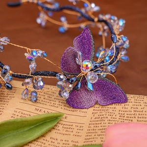 Exquisite handmade mesh butterfly headband with purple crystals and gold wire frame