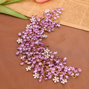 Handmade bridal hair comb with purple rhinestones and gold wire for wedding hairstyles