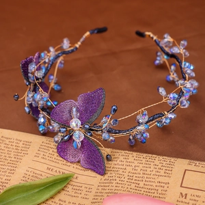 Vintage mesh butterfly headband with purple crystals and wire-wrapped beads design