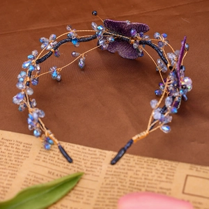 Elegant purple butterfly crystal headband with gold mesh wire and sparkling beads