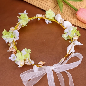 Handmade shell hairband with white fabric flowers and translucent organza ribbon tie