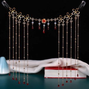 Golden cherry blossom forehead chain with red teardrop tassels for vintage bridal hair