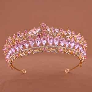 Elegant gold bridal tiara with pink teardrop crystals and sparkling rhinestones