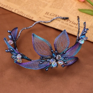 Elegant handmade bridal headband with blue rhinestone flowers and iridescent mesh petals