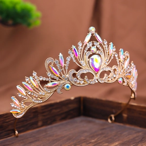 Detailed macro view of gold Baroque bridal crown featuring iridescent AB crystals and rhinestones