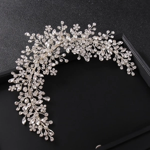 Elegant silver vine bridal headband with sparkling rhinestones for wedding hair styling