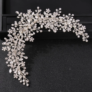 Luxurious handmade silver bridal hair vine with sparkling crystals and rhinestones for weddings