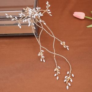Elegant gold flower hair comb with crystal leaf vine and dangling tassel chains