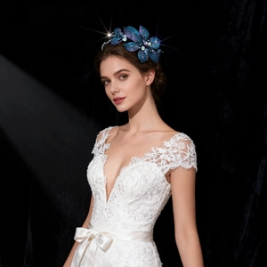 Elegant blue floral headband with rhinestones for bridal hair accessory on model