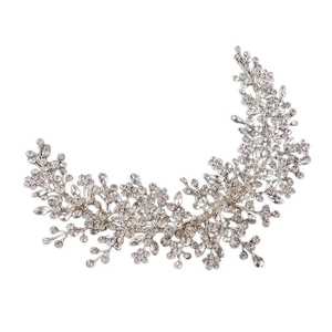 Elegant silver bridal headband with crystal flowers and leaves on a white background