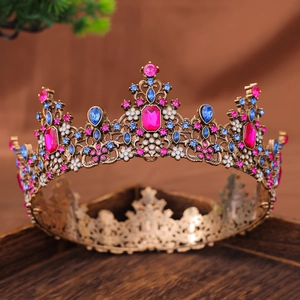 Luxurious vintage gold crown with colorful gemstones for pageant or bridal parties