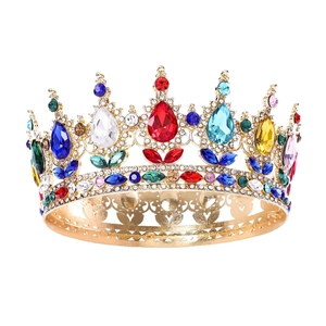 Vintage gold crown with colorful pear-shaped gemstones for wedding or party hairstyles