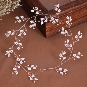 Elegant bridal pearl hair vine in rose gold wire for wedding hairstyles and accessories