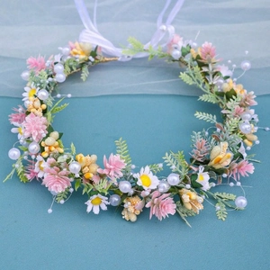 Floral bridal wreath headband with pink daisies, green leaves and pearls for weddings