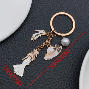 Vue détaillée d'un porte-clés femme élégant avec dimensions de 9,3 cm de long et 3,0 cm